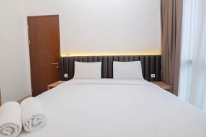 Minimalist and Homey 1BR at Ciputra World 2 Apartment By Travelio